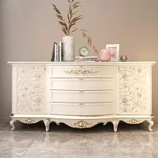 Curved wooden legs for a chest of drawers