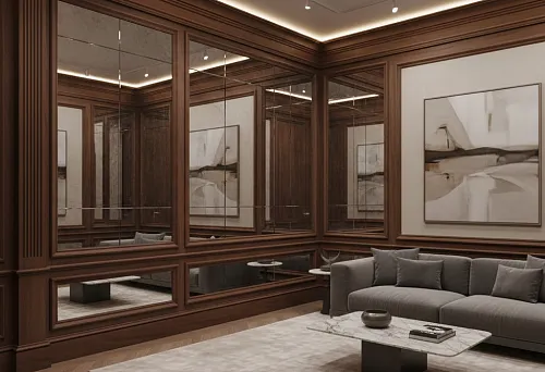 Гостиная с деревянными панелями, зеркальными вставками и молдингами в единой стилистике, серый диван и кофейный столик