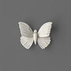 NPU-481 molding in the form of a white butterfly on a gray background.