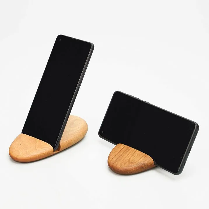 Smooth wooden phone stand shaped like a stone, suitable for vertical and horizontal positioning &mdash; SUV-001