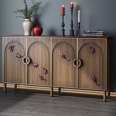 Wooden chest of drawers with red polyurethane fish decor in a modern interior.