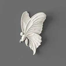 Molding decoration NPU-482R in the form of a butterfly, close-up