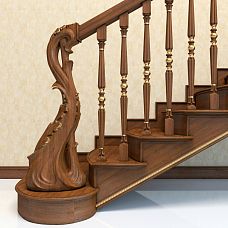 Photo of a wooden staircase with a carved column