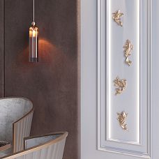 Panel in a modern interior, adorned with decorative stucco featuring golden fish and backlighting.