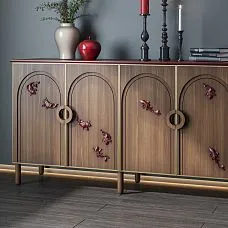 Original panel with decorative fish made of polyurethane on a wooden chest of drawers.