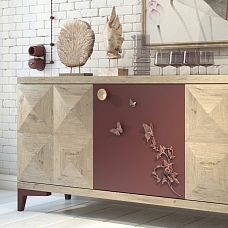 Elegant chest of drawers decorated with NPU-481 molding in the form of butterflies and floral elements.