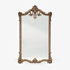 Mirror in carved wooden frame photo