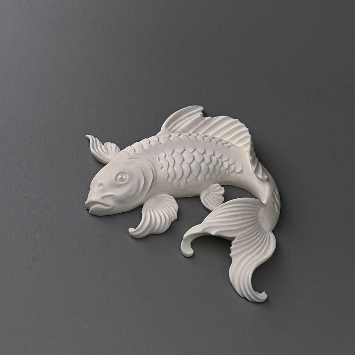 Polyurethane stucco decoration on furniture &ndash; a dresser adorned with fish from STAVROS.
