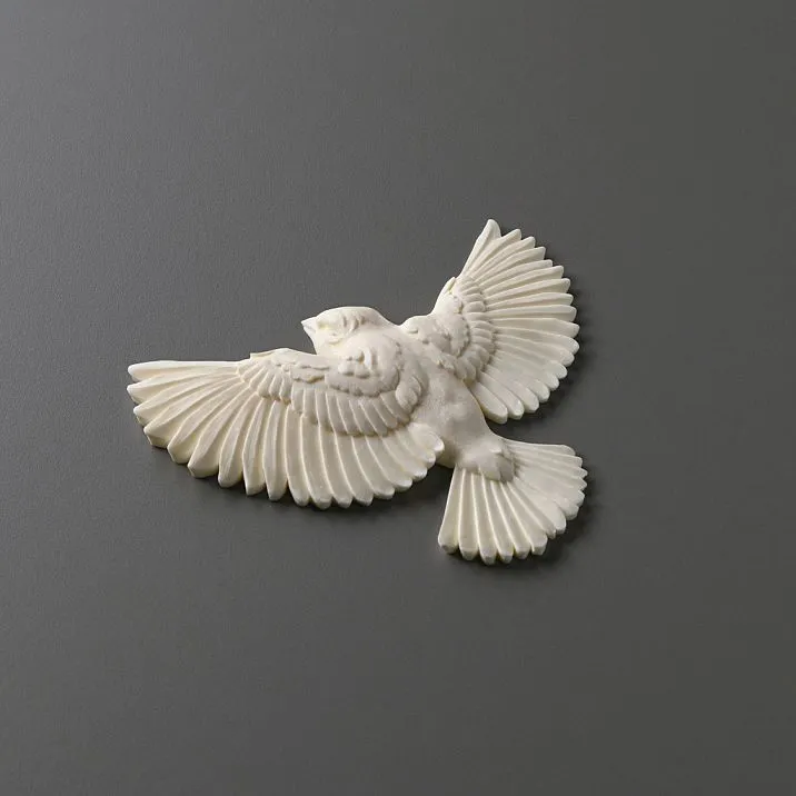 Decorative bird NPU-492R made of polyurethane - an elegant sparrow in flight for interior decor