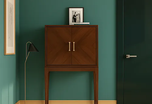 Стильный деревянный шкаф на высоких ножках с золотыми ручками в элегантном интерьере.