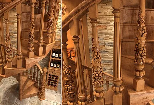 Винтовая лестница с художественной резьбой и виноградным узором.