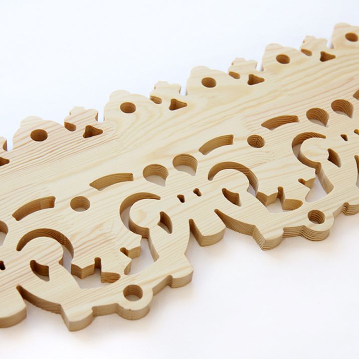 Carved Door Stop NL-8 from pine, close-up photo