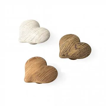 Wooden handle for children&rsquo;s furniture in the shape of a heart with wood texture