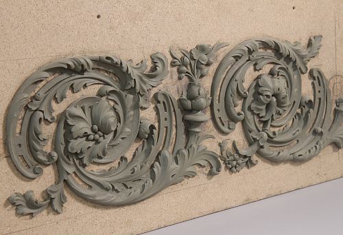 Three-dimensional ornament with plant motifs &ndash; elegant decorative element for walls.