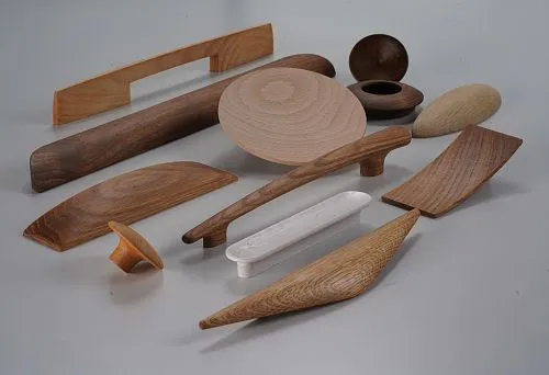 Modern wooden furniture handles in various shapes and shades &mdash; current assortment for purchase in online stores in Moscow.