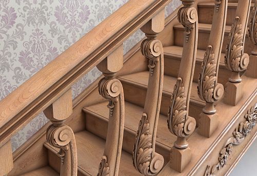 Carved larch balusters with classic ornament on the staircase