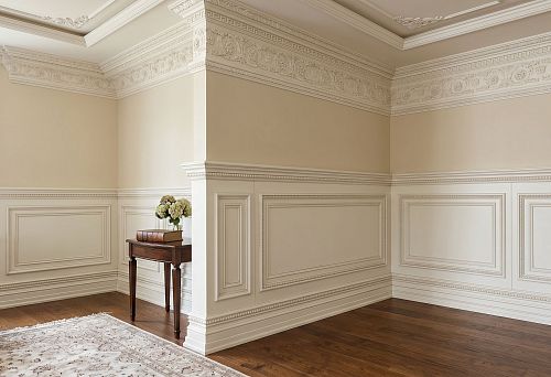 MDF skirting boards and polyurethane mouldings in interiors with wall mouldings and ceiling cornice