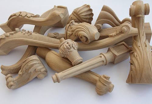 Carved wooden legs and furniture supports made of solid oak with various ornaments and shapes
