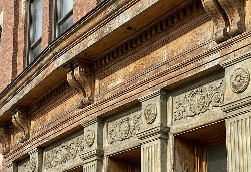 Building Facade Design with Carved Wooden and Polyurethane Elements