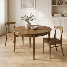 Two Archie 003-003 chairs around a round table in a modern interior