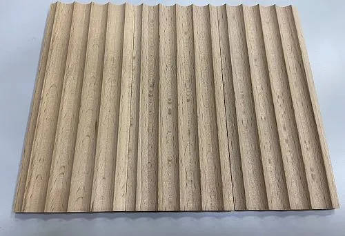 Photo of wooden plank with relief profile, suitable for interior finishing.