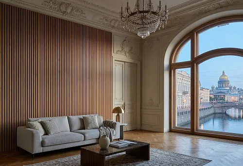 Slat wall panels in Saint Petersburg in an interior with high ceilings, stucco molding, and a crystal chandelier