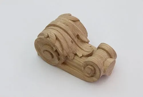Decorative furniture leg made of oak with an elegant pattern.