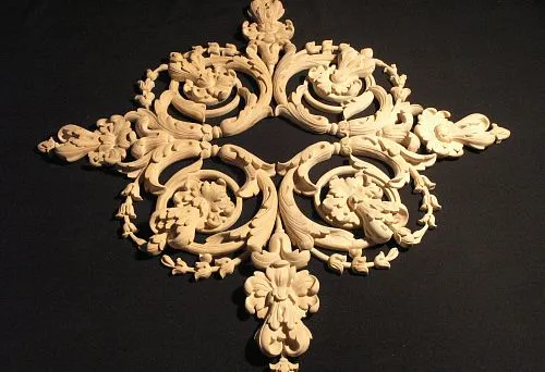 Elegant carved panel with classic ornament &ndash; exclusive decoration for a stylish interior.