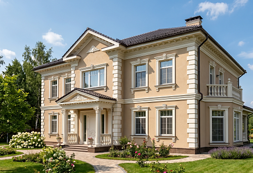 House with facade decor and polyurethane stucco in a classic style
