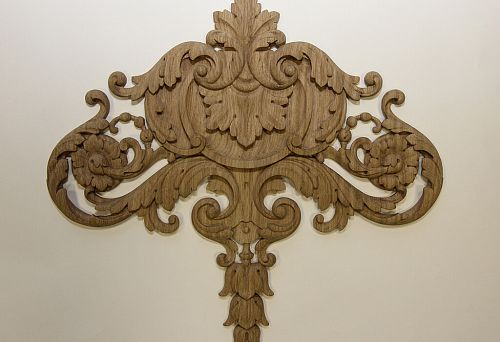 Carved wooden element on interior wall