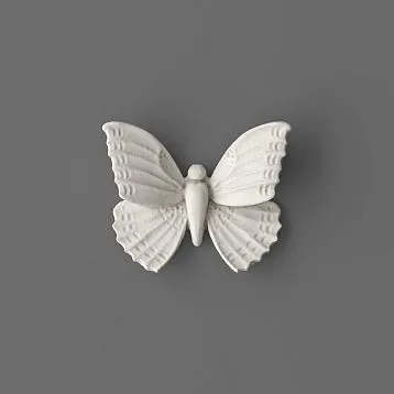 NPU-481 molding in the form of a white butterfly on a gray background.