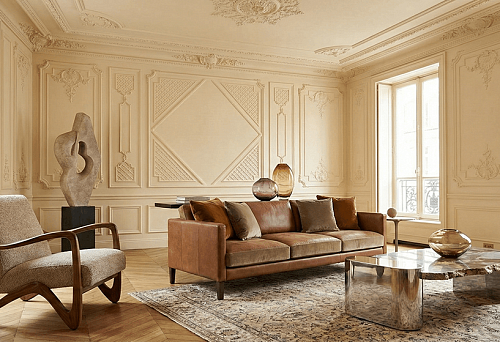 Exclusive polyurethane stucco on walls and ceiling: a custom interior with a leather sofa and art objects