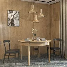 Two Archie 003-003 chairs around a round table in a modern interior