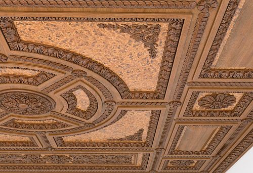 Unique ceiling design using carved moldings and Stavros outlets.