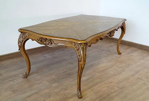 Handmade wooden coffee table with artistic carving.