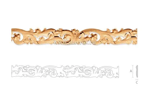 Carved wooden window frame with floral ornament and curved contour