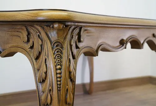 Carved wooden bed with handcrafted decorative elements