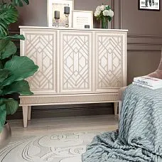 Geometric legs MN-192M on a light chest in a modern bedroom interior.