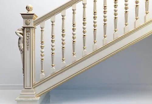 Elegant wooden staircase with white carved balusters and gilded decorative elements