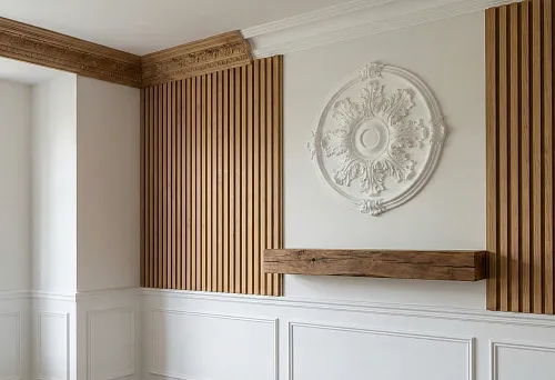 Wall finishing with polyurethane slats and moldings: 3D effect, vertical wooden slats and a decorative rosette on a white wall