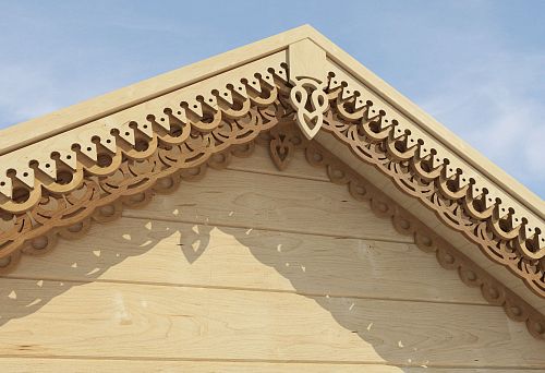 Wooden gable with decorative carved elements