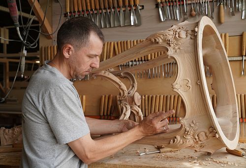 Furniture with exquisite carved details during manufacturing