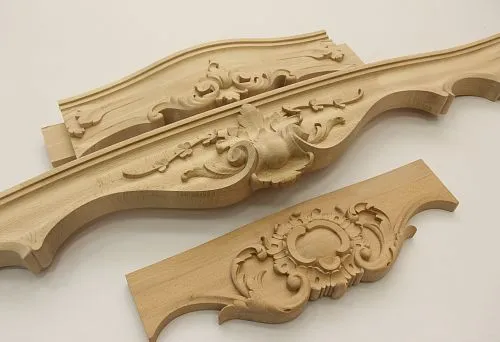 Detailed wood carving pattern, highlighting the beauty of traditional applied arts.
