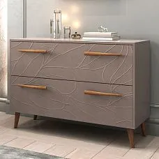 Turned legs MN-145.2M on a dresser with decorative front in a modern bedroom interior.