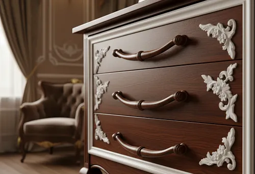 Wooden furniture handles on a classic chest of drawers with decorative overlays &mdash; an example of how wooden hardware supports the traditional interior style and classic furniture
