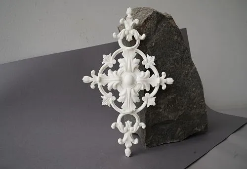 Polyurethane Decorative Element with Classic Ornamentation Against Stone Background