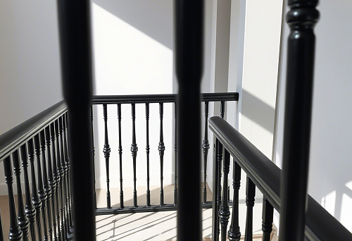 Black balusters and newel posts for stairs in modern interior, buy balusters for stairs