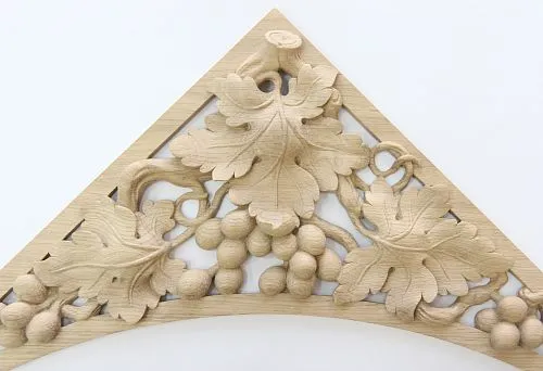 Triangular wooden molding with classic ornament