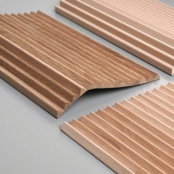 Samples of slat panel OPAN-005 made of MDF, beech and oak with longitudinal relief