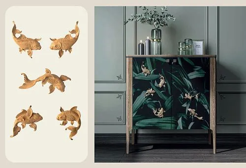 Modern cabinet with fish decor against a green interior with refined details.